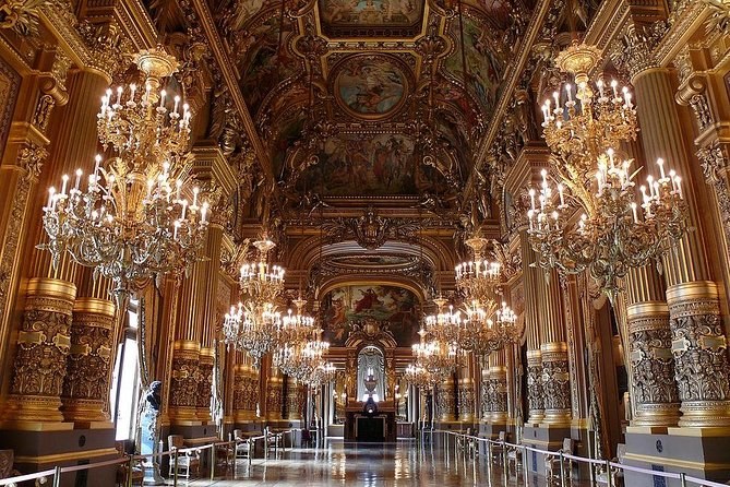Chandeliers hung down the whole length of the Grand Foyer